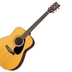 Продам новую.Акустическая гитара YAMAHA F 310.с документами и гарантие